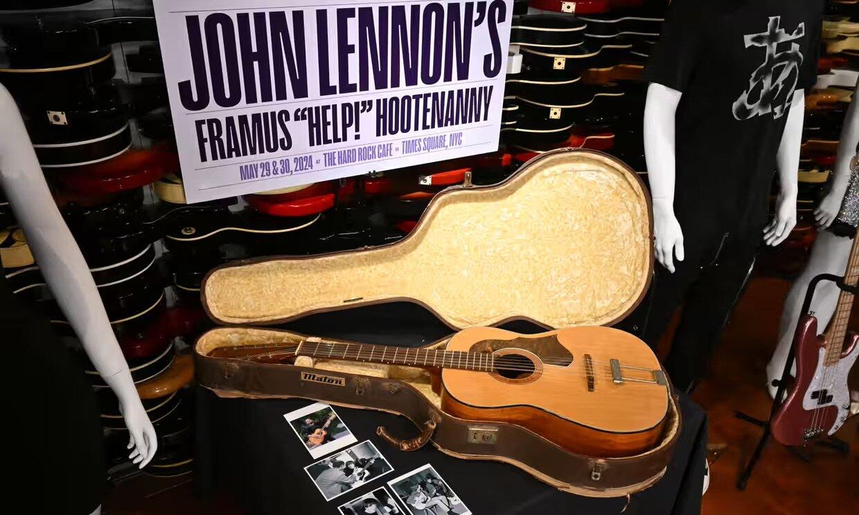John Lennon guitar sells for $2.9m, breaking Beatles auction record